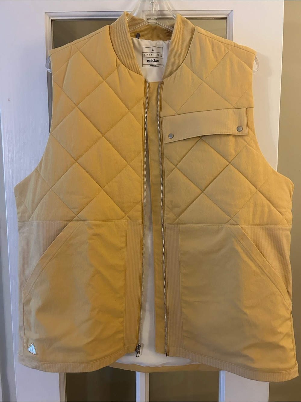 Men’s Adidas quilted vest. Never been worn. NWOT sz. L